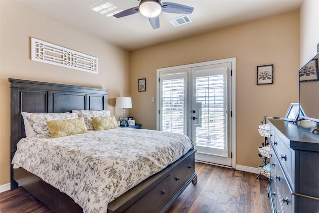 bedroom featuring access to outside, dark hardwood / wood-style floors, ceiling fan, and french doors