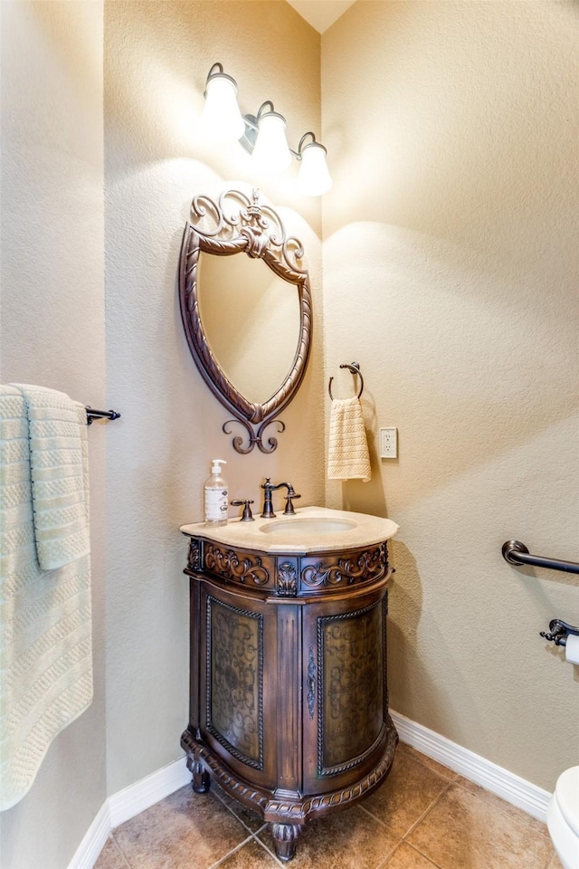 bathroom with vanity and tile patterned flooring