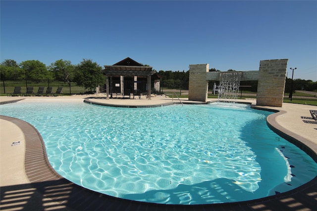 view of pool featuring a gazebo and a patio