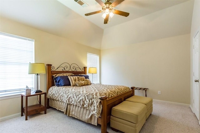 bedroom with ceiling fan, light colored carpet, and lofted ceiling