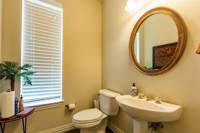 bathroom with sink and toilet