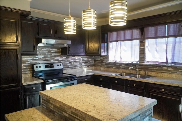 kitchen featuring sink, tasteful backsplash, pendant lighting, electric stove, and a kitchen island