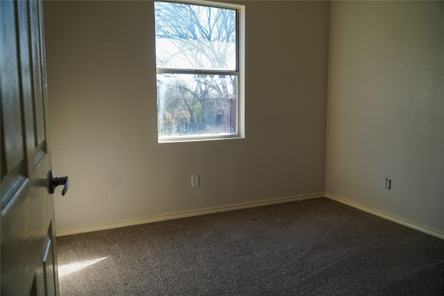 view of carpeted spare room