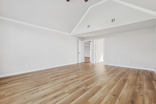 unfurnished room with ceiling fan, crown molding, high vaulted ceiling, and light hardwood / wood-style floors