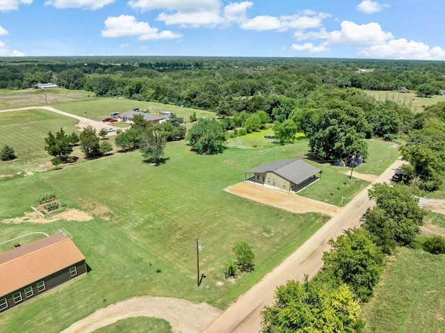 birds eye view of property featuring a rural view