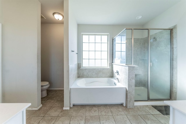 full bathroom featuring tile patterned floors, vanity, separate shower and tub, and toilet