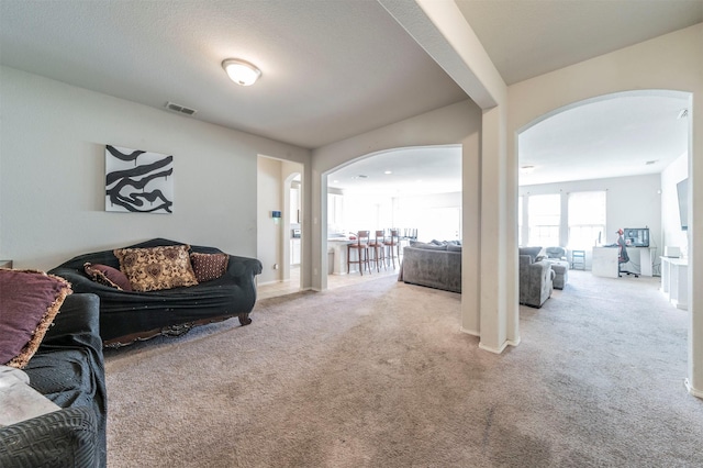 living room with light carpet