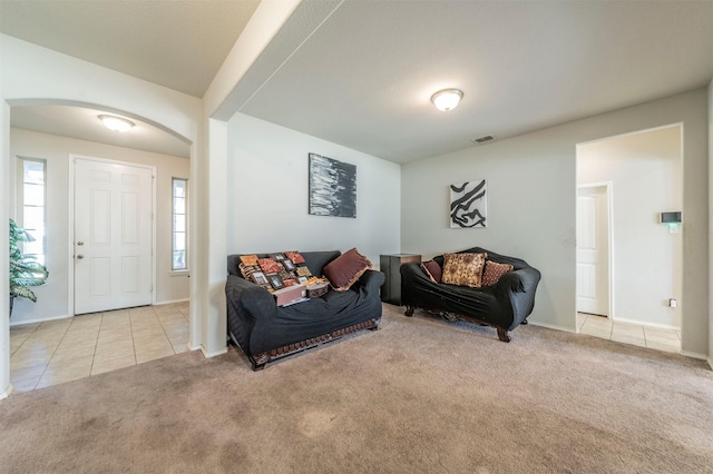 living room featuring light colored carpet