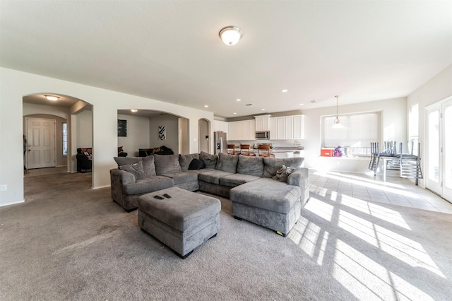 living room with light colored carpet