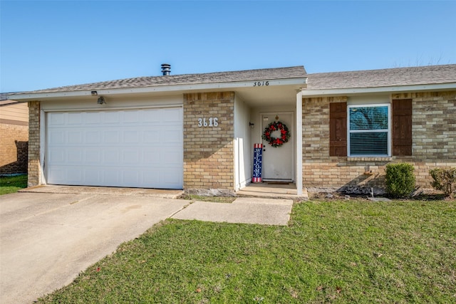 ranch-style house with a front lawn and a garage