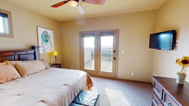 bedroom featuring light carpet, access to outside, and ceiling fan