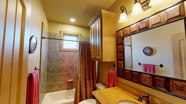 full bathroom with vanity, shower / bathtub combination with curtain, and toilet