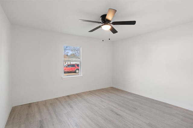 unfurnished room featuring ceiling fan and light hardwood / wood-style floors