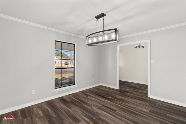 unfurnished dining area with a notable chandelier, crown molding, and dark wood-type flooring