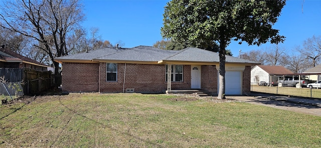 ranch-style home with a garage and a front yard