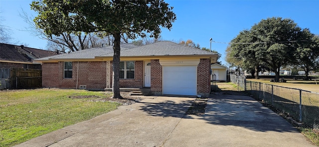 ranch-style house featuring a garage and a front lawn