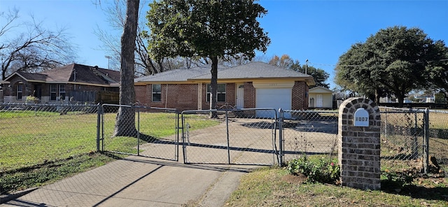 view of front of house featuring a garage and a front lawn