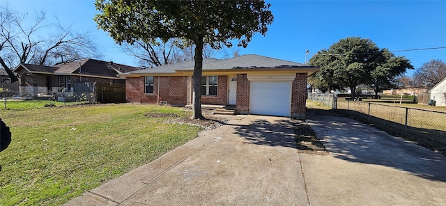 ranch-style home with a front yard and a garage