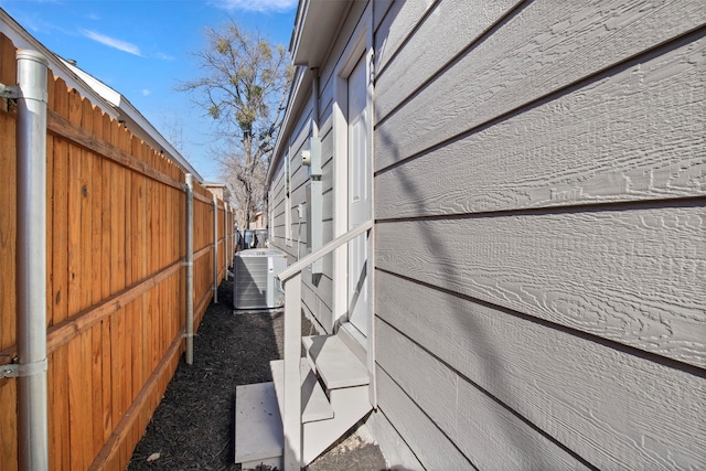 view of property exterior with central AC