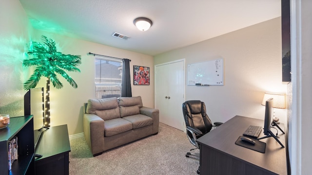 office area with light colored carpet