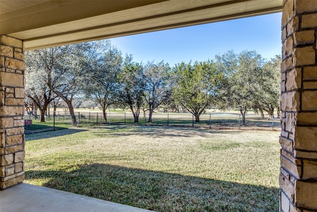 view of yard with a rural view