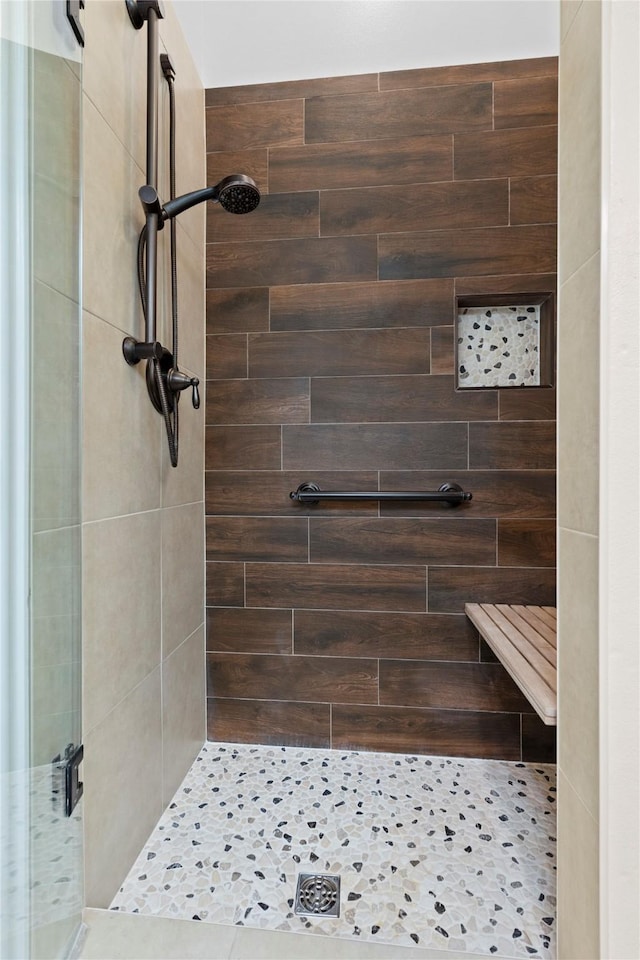 bathroom featuring a stall shower