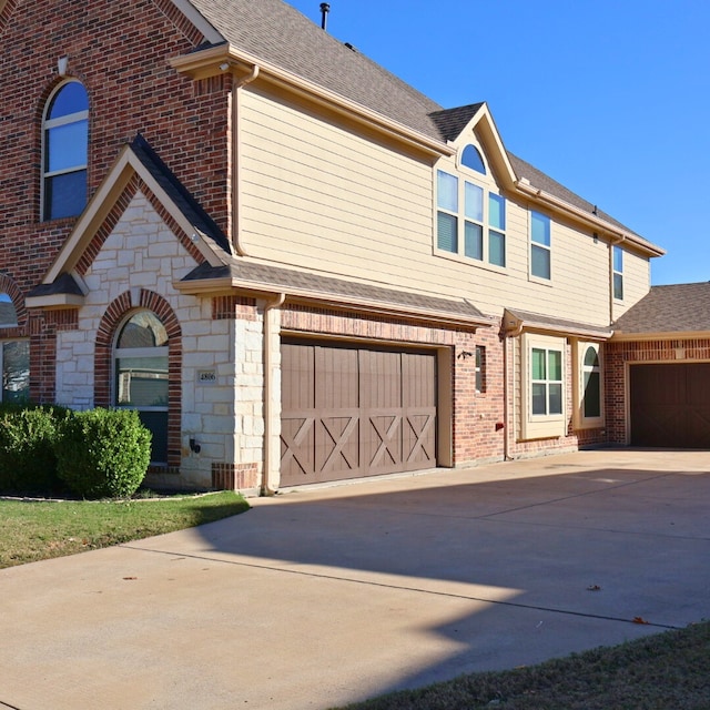 view of front of home with a garage