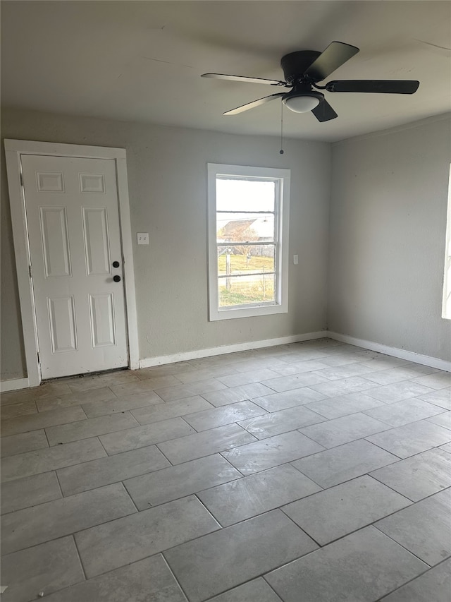 empty room featuring ceiling fan