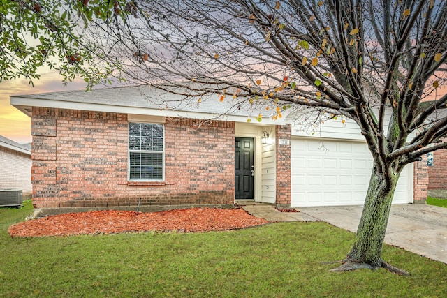 ranch-style home featuring cooling unit and a lawn