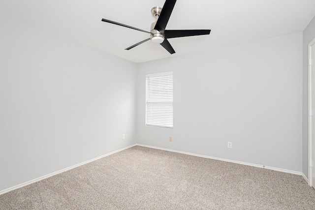 unfurnished room featuring carpet floors and ceiling fan