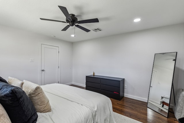 bedroom featuring ceiling fan and dark hardwood / wood-style flooring