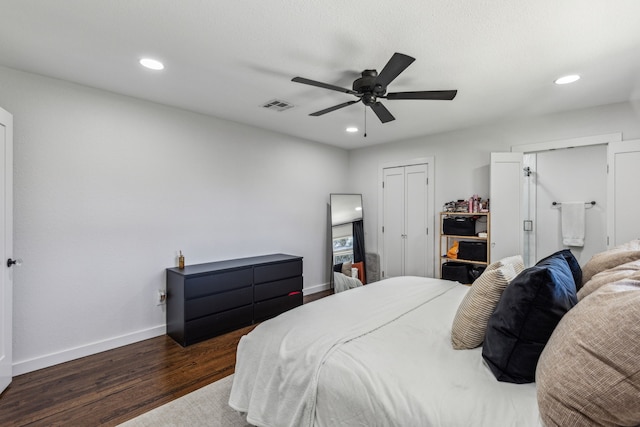 bedroom featuring dark hardwood / wood-style floors and ceiling fan