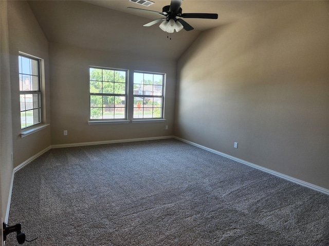 carpeted spare room with ceiling fan and lofted ceiling