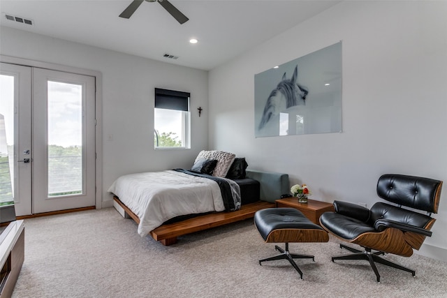 bedroom featuring carpet flooring, access to exterior, ceiling fan, and french doors