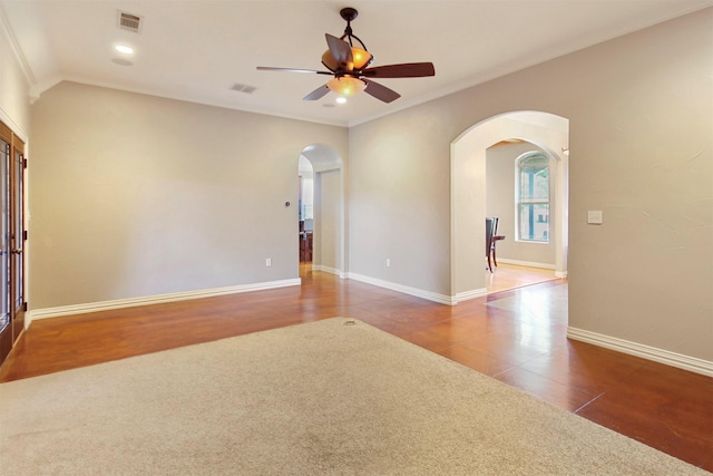 unfurnished room featuring tile patterned flooring, ceiling fan, and ornamental molding