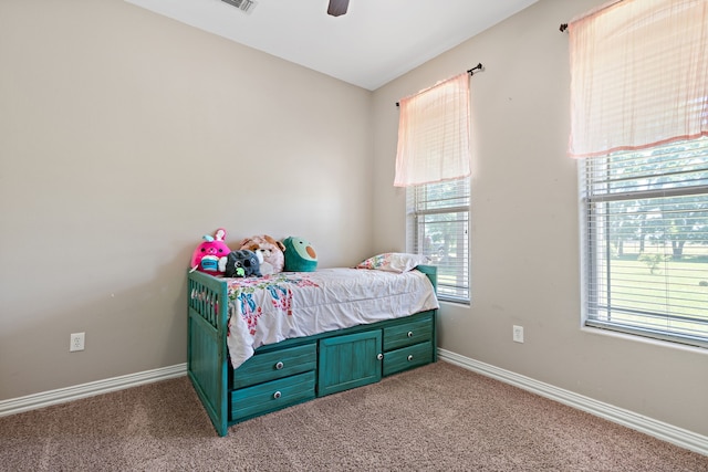 bedroom featuring ceiling fan and carpet floors