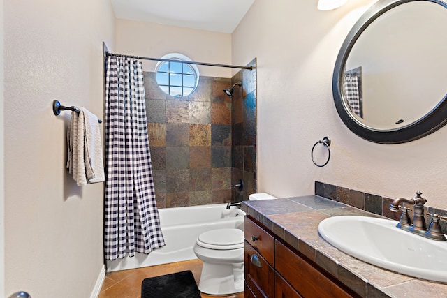 full bathroom featuring vanity, tile patterned flooring, shower / bathtub combination with curtain, and toilet