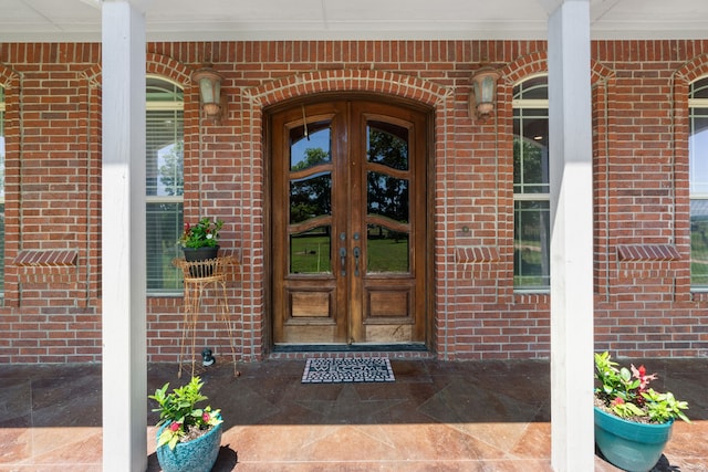 doorway to property featuring french doors