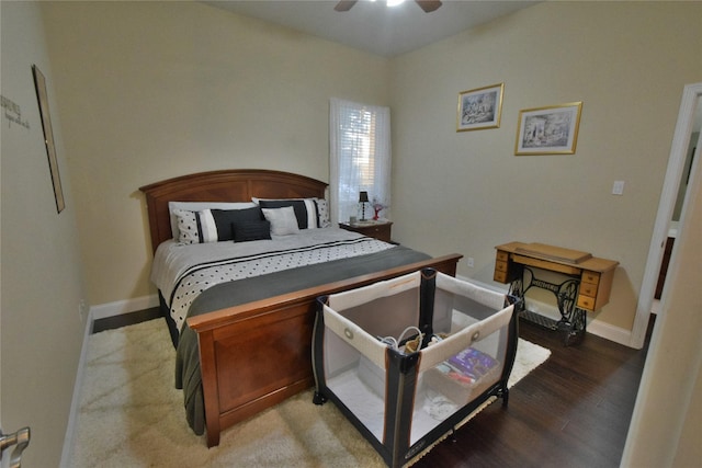 bedroom featuring ceiling fan and hardwood / wood-style flooring