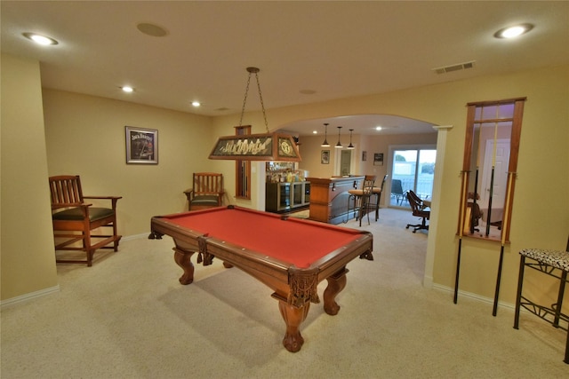 game room featuring bar, light carpet, and billiards