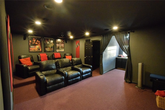 home theater room featuring carpet flooring