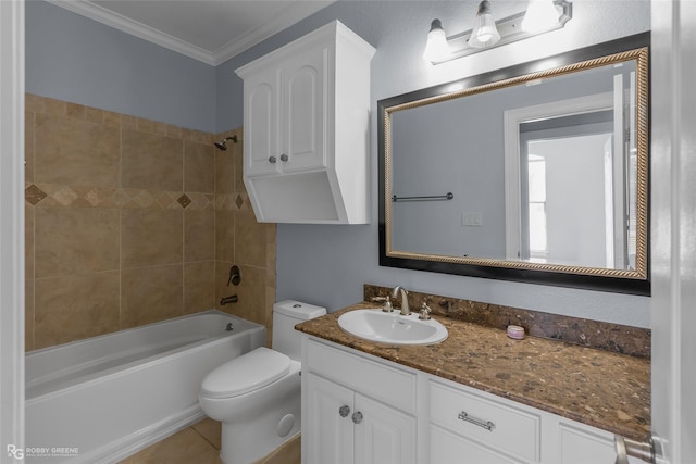 full bathroom featuring crown molding, tiled shower / bath combo, vanity, tile patterned floors, and toilet