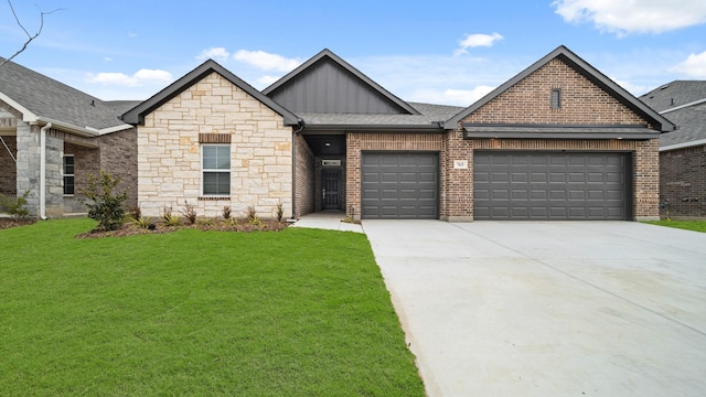 view of front of home featuring a garage and a front yard