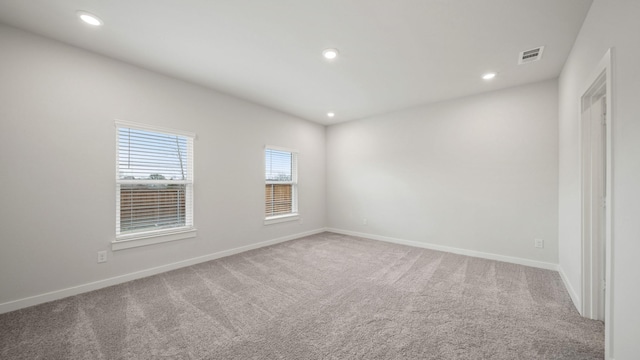 view of carpeted spare room