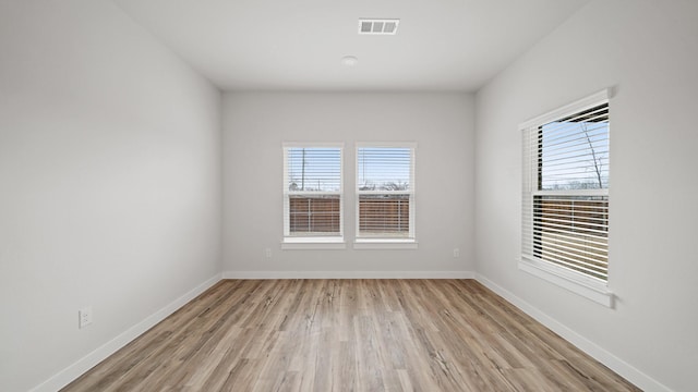 empty room featuring light hardwood / wood-style floors