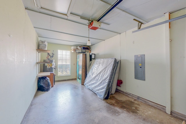 garage featuring electric panel and a garage door opener