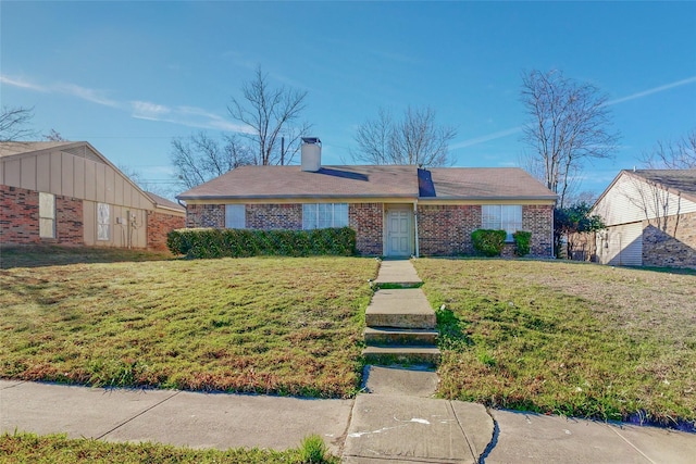 single story home featuring a front yard