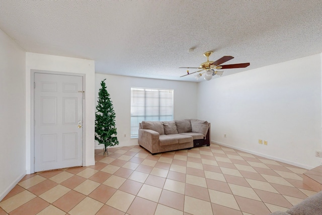 unfurnished living room with a textured ceiling and ceiling fan