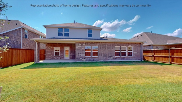 back of property featuring a yard and a patio area