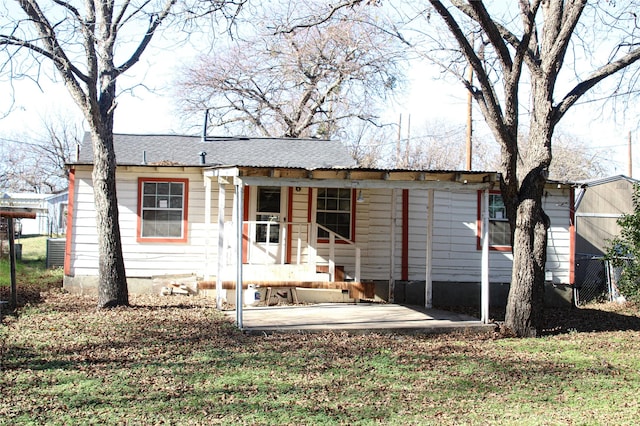 rear view of house featuring a patio